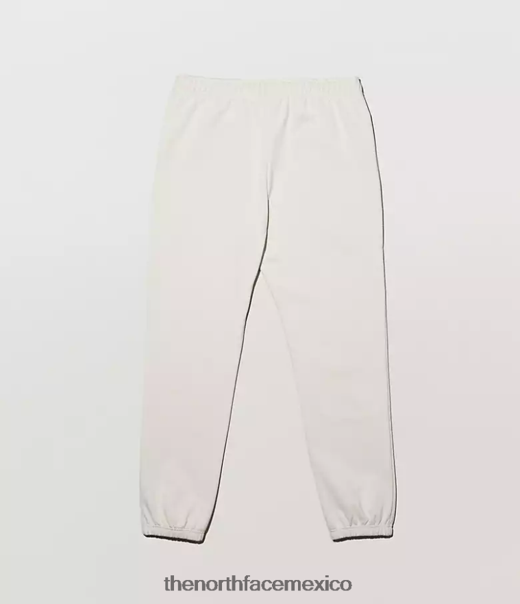 The North Face ropa NFHLJL551 marfil claro de luna hombres pantalones deportivos tnf x kaws